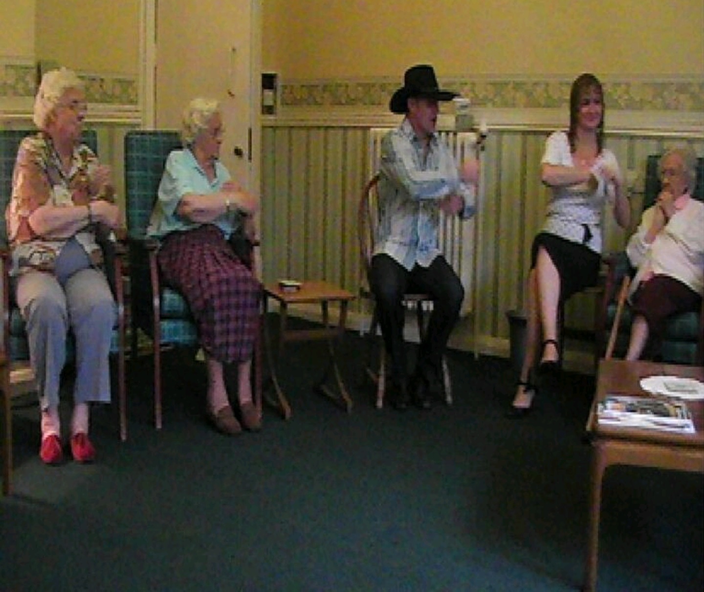 William McKechnie alias Wild Bill teaching seniors dancing from a seated position